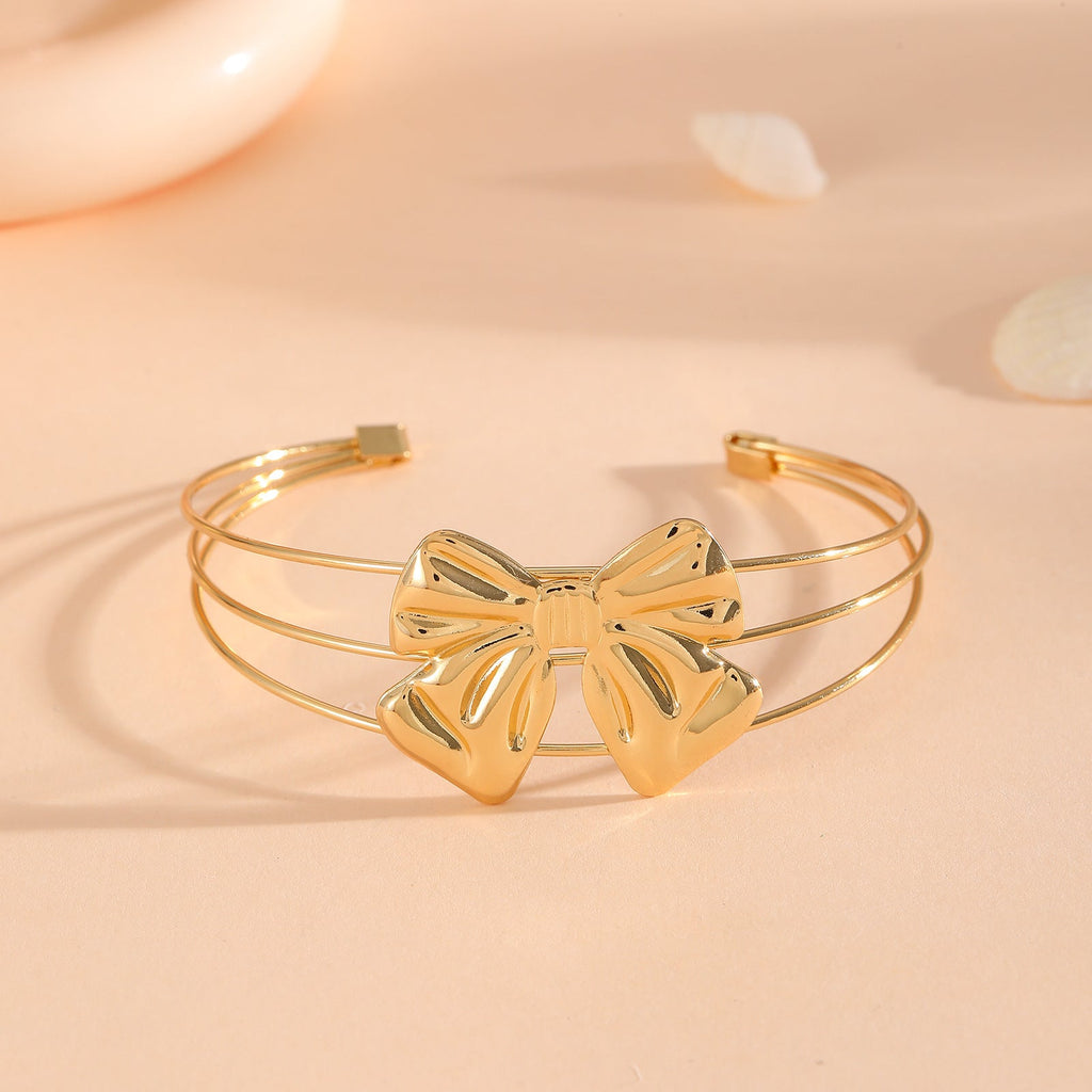 Women's bracelet with intricate bow design Fashion Glam