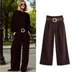 Women's high-waisted culotte pants with wide leg, pleats and statement belt Fashion Glam