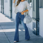 Women's vintage-inspired high-waisted flared jeans with sculpting seam details Fashion Glam