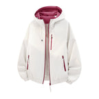 Women's lightweight hooded shell jacket in urban look with contrasting lining, zippered pockets, and elastic hem Fashion Glam