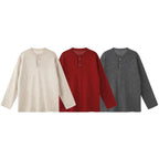 Unisex Oversize knit sweater with Henley button placket, straight hem and light texture Fashion Glam