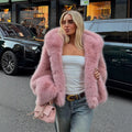Women's short coat made of fluffy synthetic fur with voluminous shawl collar and boxy oversized silhouette Fashion Glam