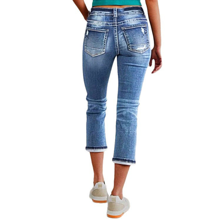 Women's cropped jeans with turn-up, mid-rise waist and used wash Fashion Glam