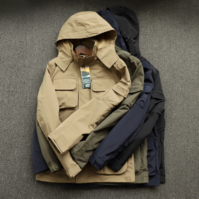 Men's urban field jacket with multiple pockets, wind-resistant surface and concealed hood Fashion Glam
