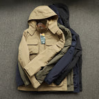 Men's urban field jacket with multiple pockets, wind-resistant surface and concealed hood Fashion Glam
