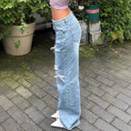 Women High-Waist Baggy Jeans with Vintage Wash, Rips and Pink Bow Applications Fashion Glam