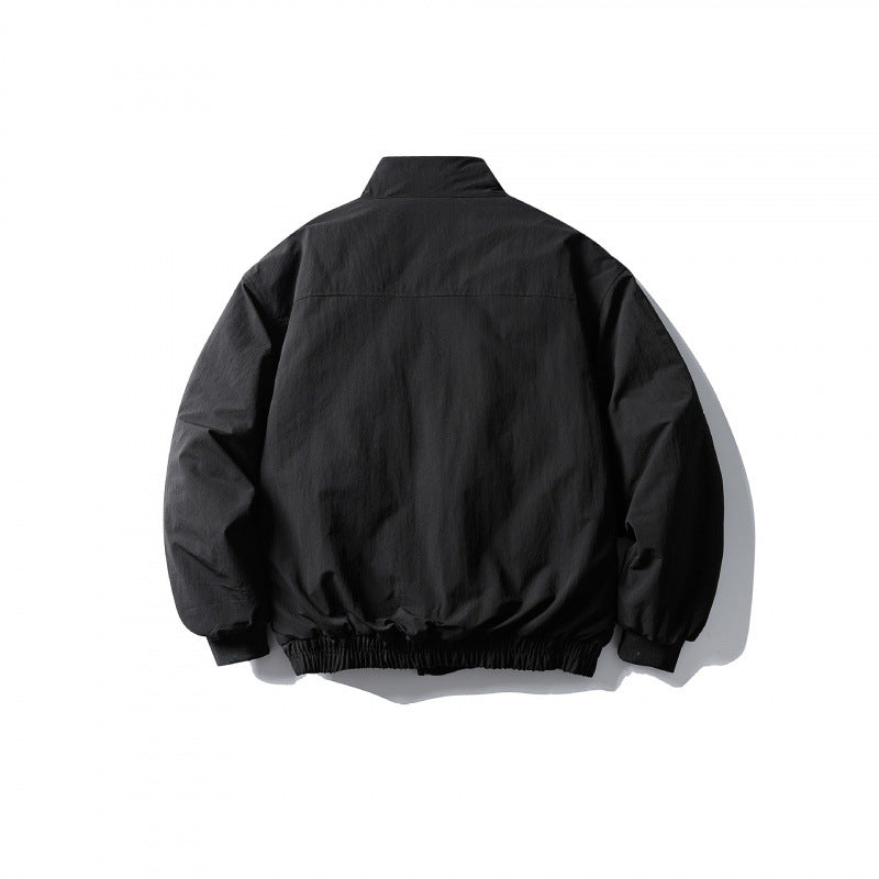 Unisex short boxy isolation jacket with diagonal flap pocket detail and elastic hem Fashion Glam