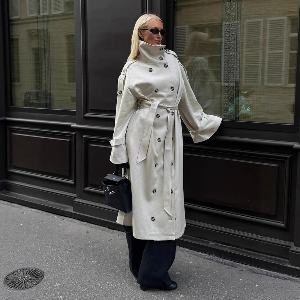 Women's long leather look trench coat with high stand-up collar, waistband and double-breasted button placket Fashion Glam