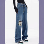 Women high-waisted oversized baggy jeans with knee rip and wide leg Fashion Glam