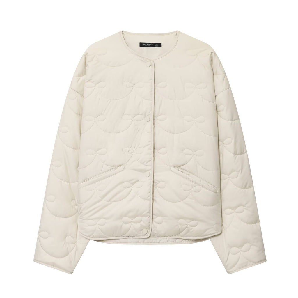 Women's short cut quilted jacket with round neckline and tonal bow quilting Fashion Glam