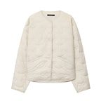 Women's short cut quilted jacket with round neckline and tonal bow quilting Fashion Glam