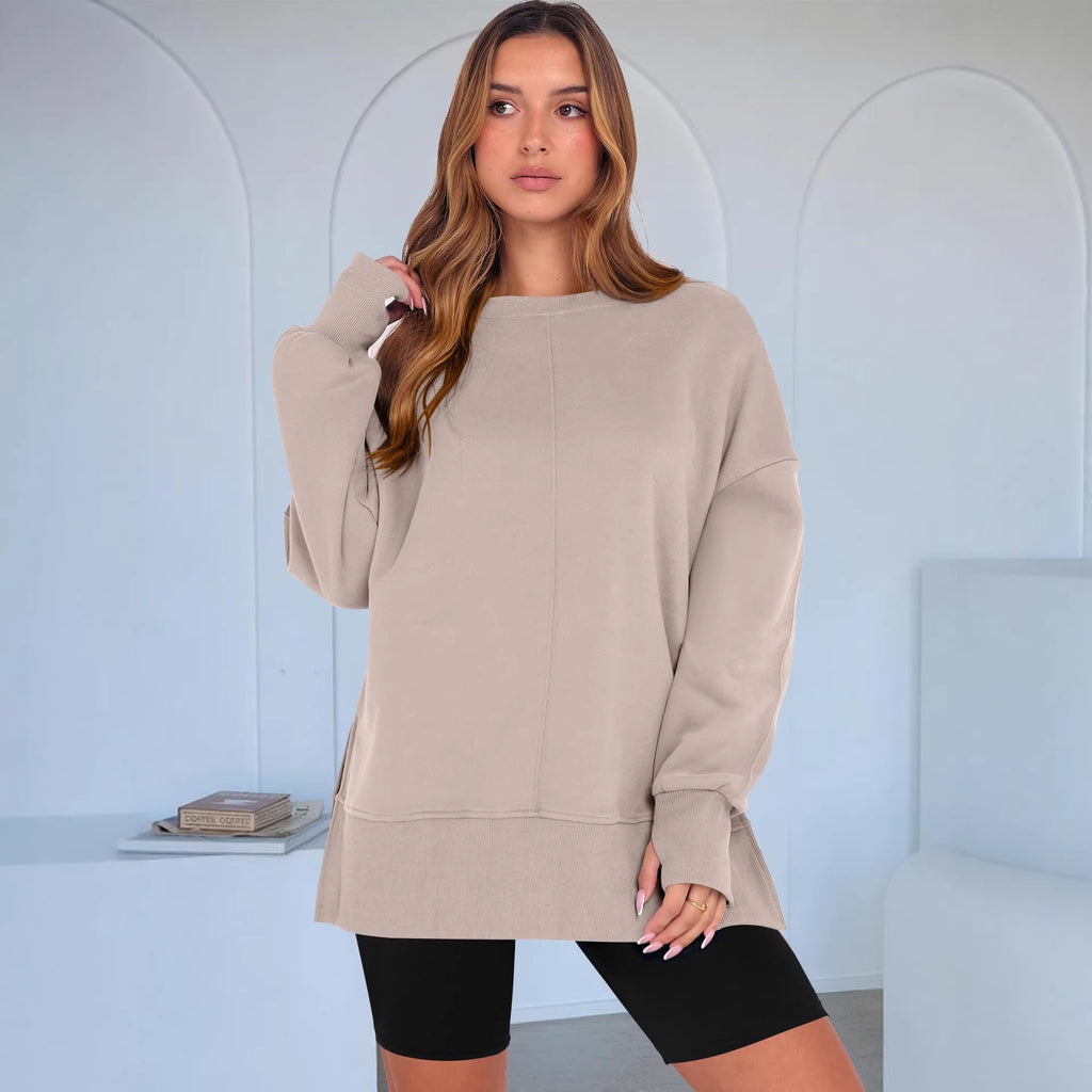Women's Oversize Sweatshirt with Center Seam, Extended Hem, and Ribbed Cuffs Fashion Glam
