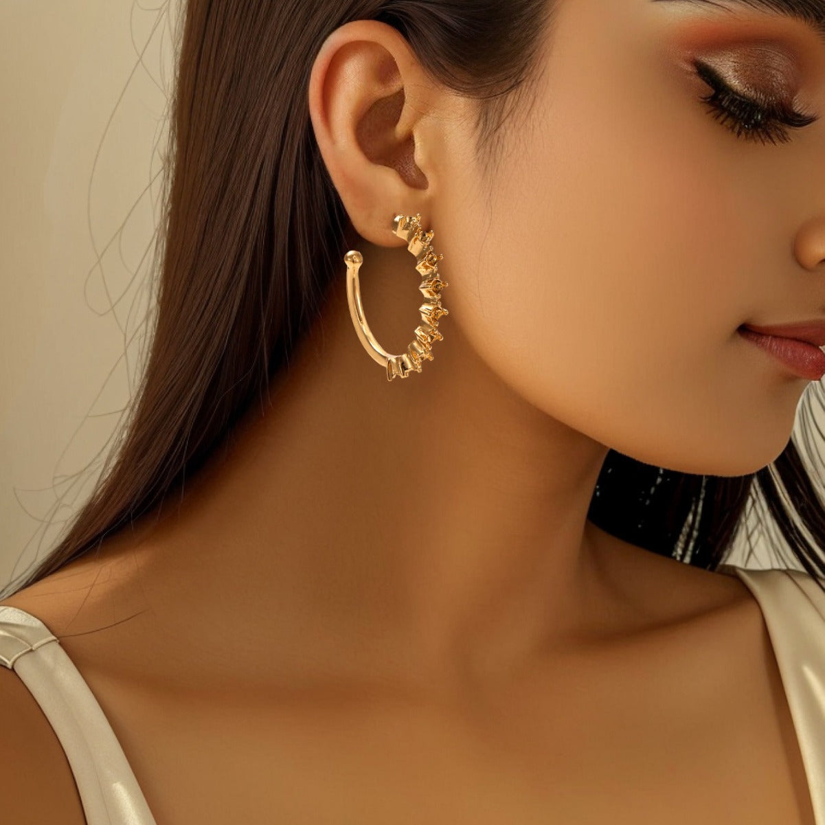 Ladies hoop earrings with intricate structures Fashion Glam