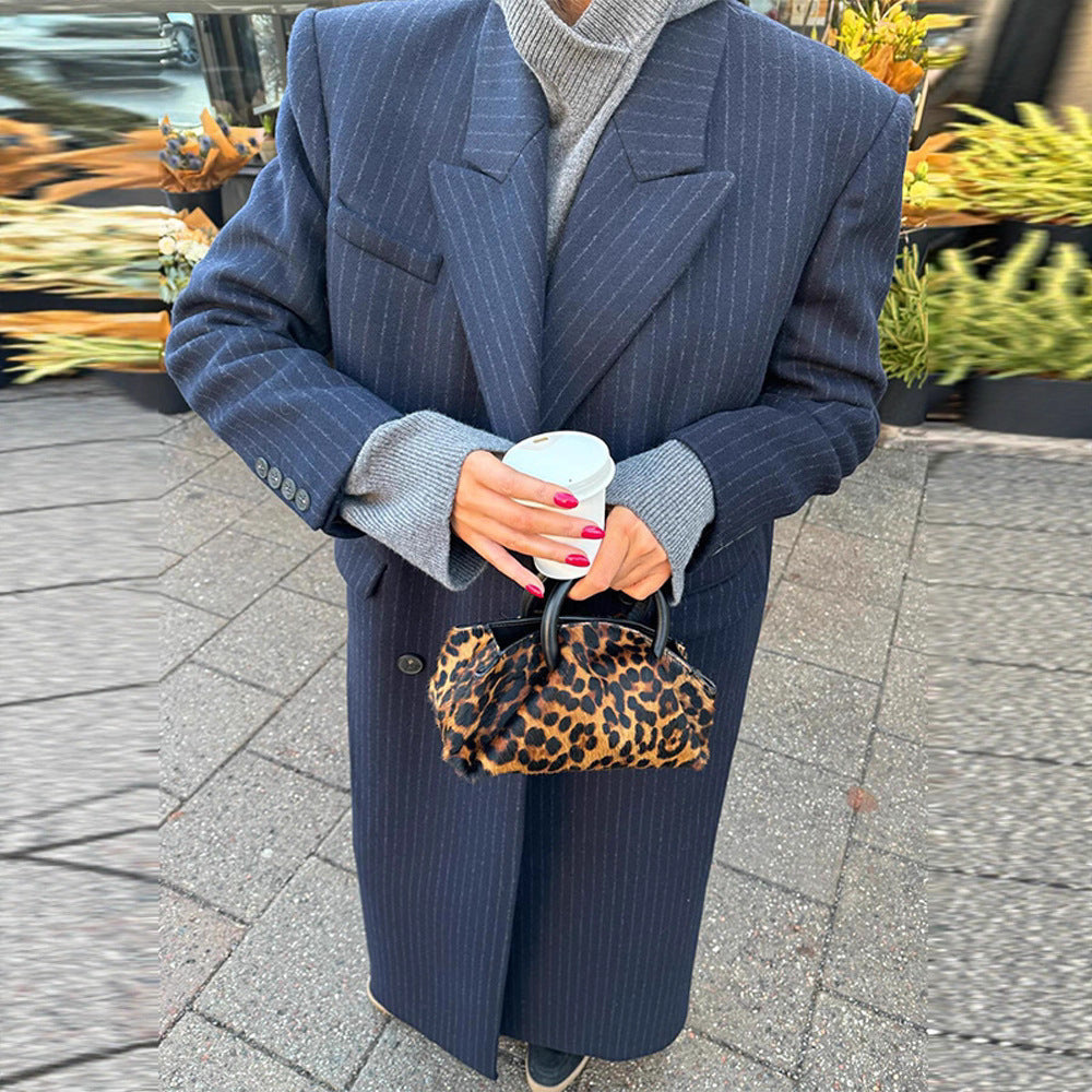 Women's maxi coat in pinstripe look with double-breasted button placket and lapel collar Fashion Glam