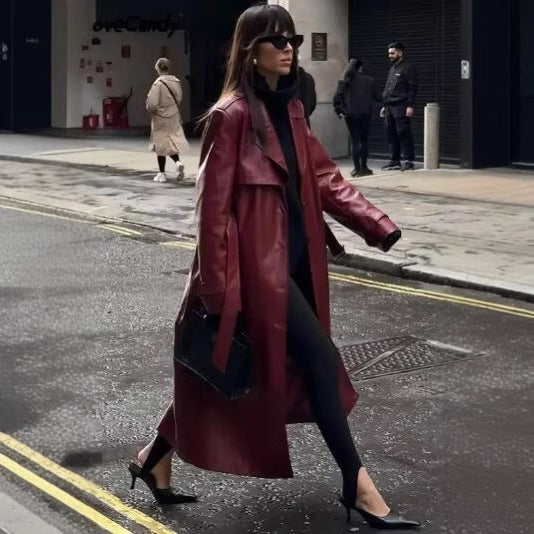 Women's Maxi Length Faux Leather Trench Coat with Wide Lapels, Back Detail, and Tie Belt Fashion Glam