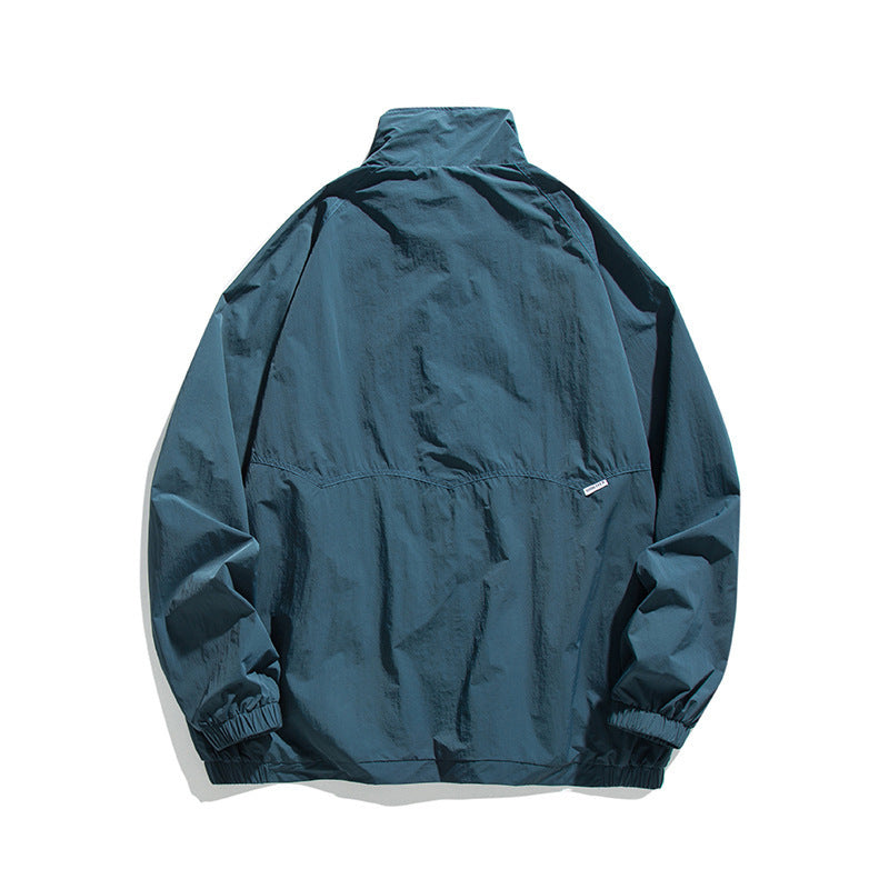 Men's Lightweight Oversized Field Jacket made of technical nylon with stand-up collar, concealed zipper, and flap pockets Fashion Glam