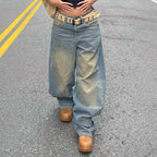 Women's vintage-inspired baggy jeans with a low rise, wide leg, and distressed wash Fashion Glam