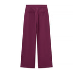Ladies tailored tuxedo pant suit with feather embellishments at the cuffs Fashion Glam