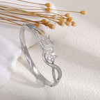 Women's bangle with elegant infinity pattern and sparkling zirconia Fashion Glam