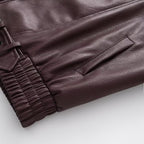 Ladies Oversize Faux Leather Biker Jacket with Asymmetrical Zipper, Belt and Elastic Waist Fashion Glam