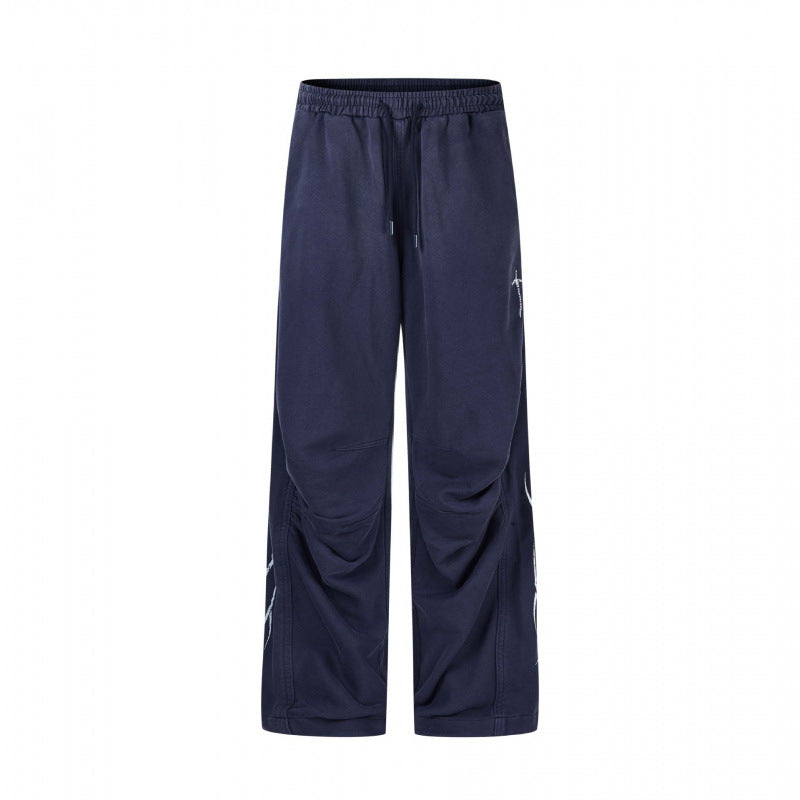 Men's loose sweatpants in baggy cut with elastic waistband, drawstring and gathered knee area Fashion Glam