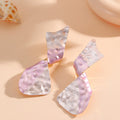 Ladies earrings in modern disc design Fashion Glam