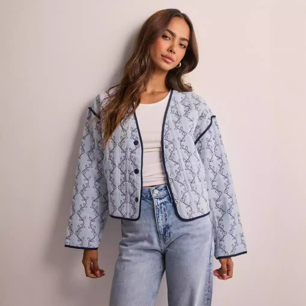 Women's lightweight quilted blouse jacket with V-neck, contrast piping and floral line print Fashion Glam