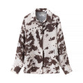Women's loosely cut shirt blouse with cow spot print and concealed button placket Fashion Glam