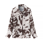 Women's loosely cut shirt blouse with cow spot print and concealed button placket Fashion Glam
