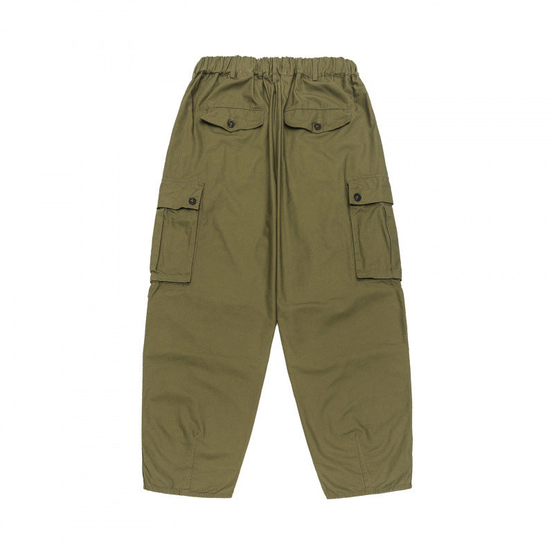 Unisex Oversize Cargo Pants with drawstring waistband, layer detail and snap hem Fashion Glam