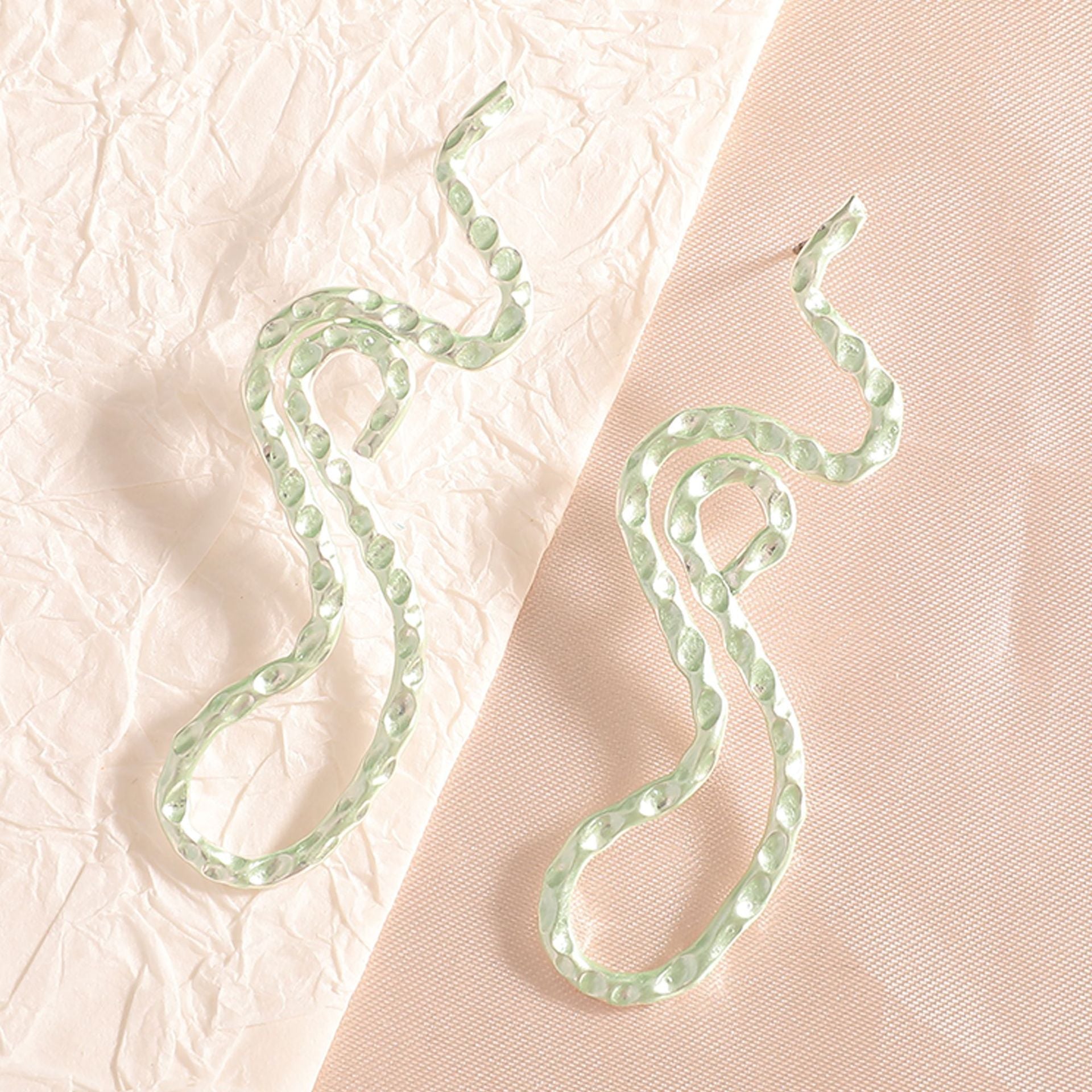 Ladies earrings in elegant wave pattern Fashion Glam