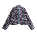 Women's quilted short jacket in kimono style with floral quilted look and contrasting piping Fashion Glam