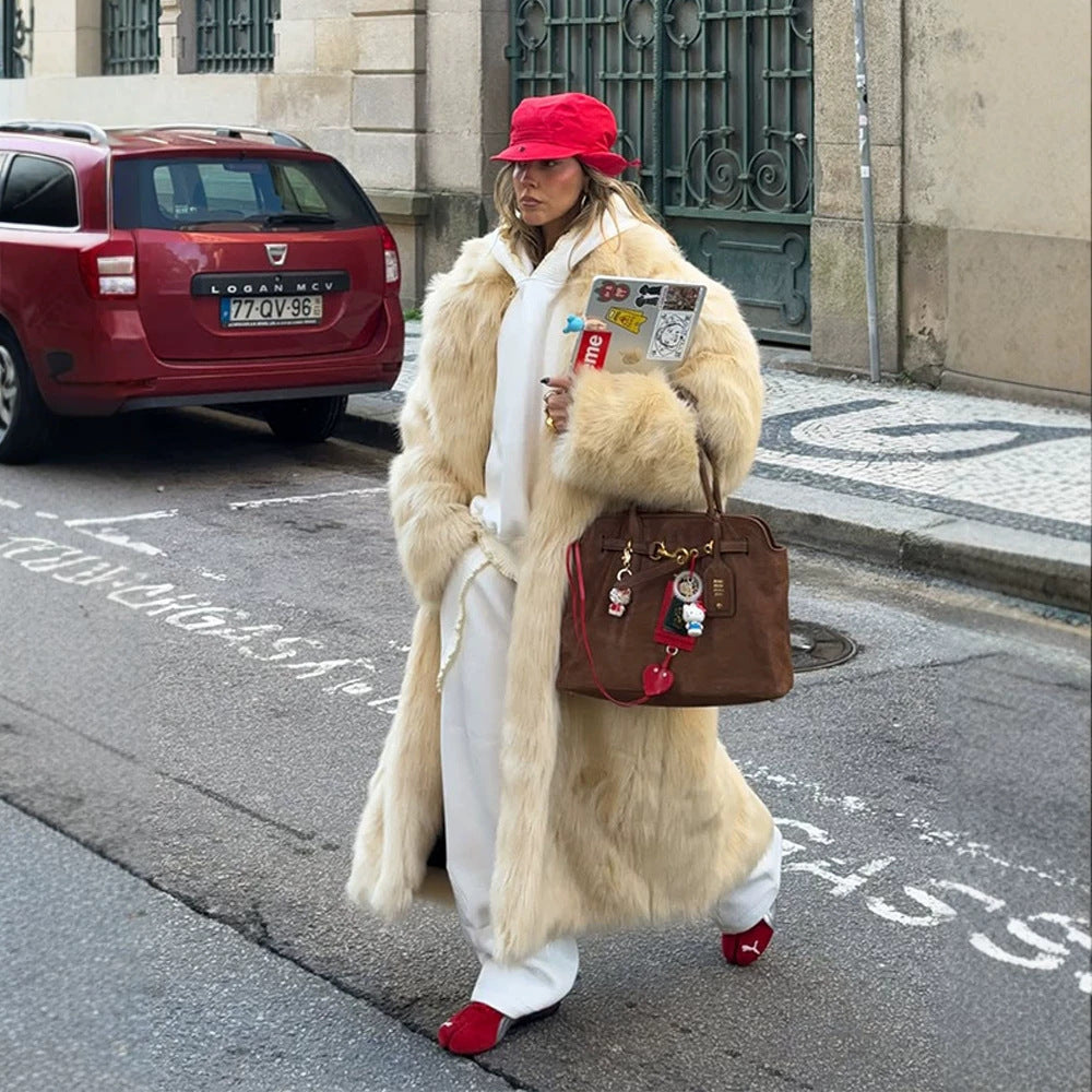 Women's Extravagant Long Coat made of High-Pile Faux Fur with Voluminous Shawl Collar and Tailored Silhouette Fashion Glam