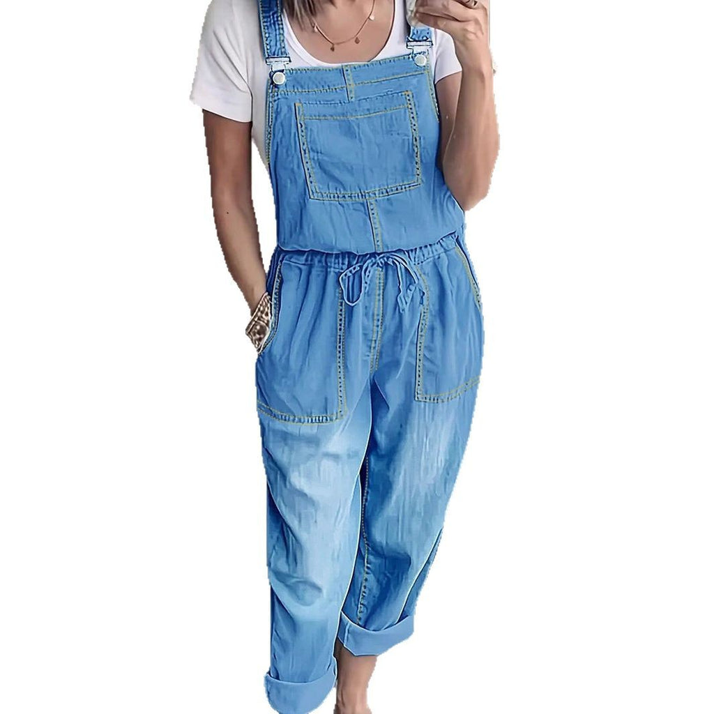 Women's overall jumpsuit made of lightweight denim with a drawstring waistband, patch pockets, and turned-up hem Fashion Glam