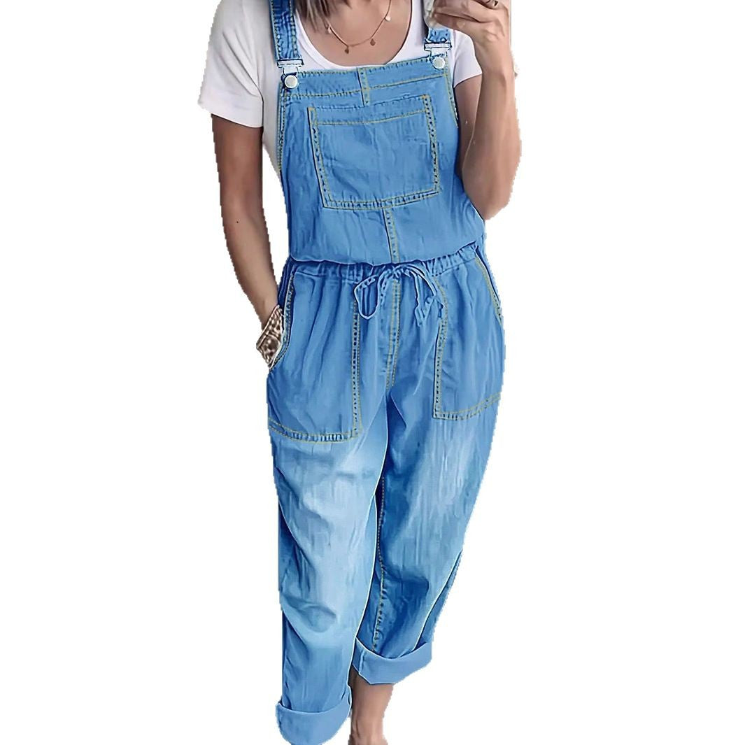Women's overall jumpsuit made of lightweight denim with a drawstring waistband, patch pockets, and turned-up hem Fashion Glam