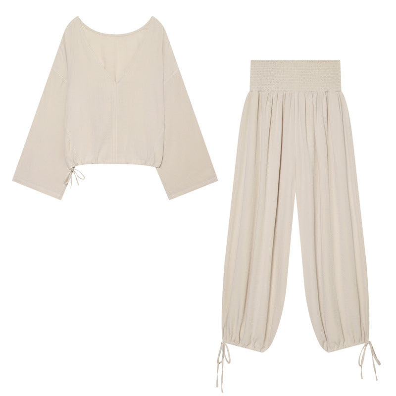 Women’s harem pants with high smock waistband, wide fall and adjustable cord closures Fashion Glam