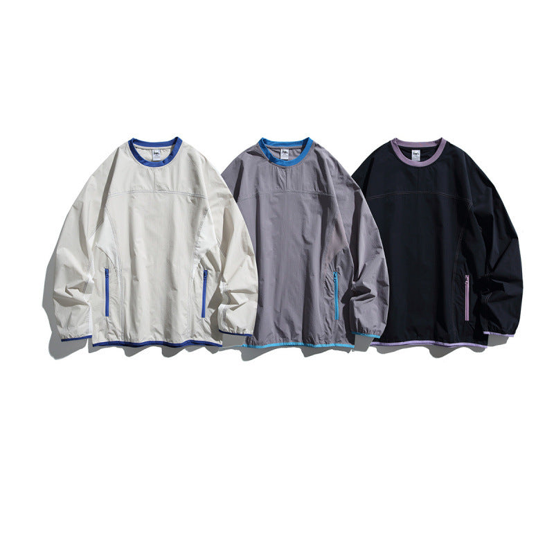 Unisex Lightweight technical oversized sweater with round neckline, zippered pockets, and contrasting finishes Fashion Glam