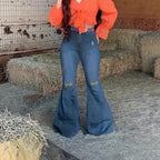 Women’s figure-hugging flared jeans with retro flair, featuring distressed knees and a waist-shaping comfort waistband Fashion Glam