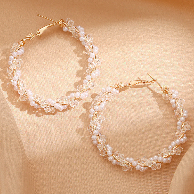 Ladies hoop earrings with luxurious pearl accents and elegant, twisted design Fashion Glam