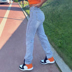 Women's high-waisted jeans with straight leg, knee rips, and stacked hem Fashion Glam