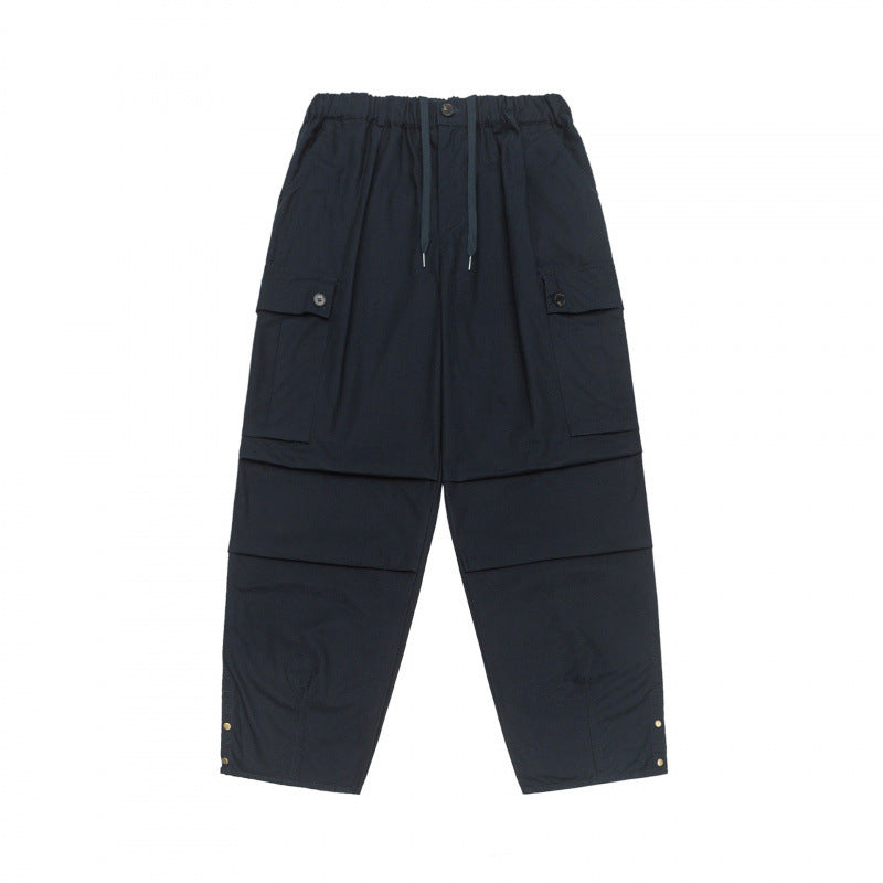 Unisex Oversize Cargo Pants with drawstring waistband, layer detail and snap hem Fashion Glam