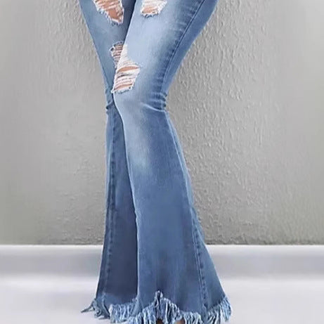 Women High-Waist Flared-Jeans with sculpting cut, destroyed knee parts and frayed ruffle hem Fashion Glam