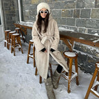 Women's hooded coat made of faux fur with a waist belt and extra soft teddy finish Fashion Glam