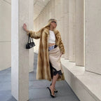 Women’s longer luxurious fur coat with wide lapels and concealed button placket Fashion Glam