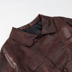 Women's short jacket made of faux leather in a boxy cut with snap button closure Fashion Glam