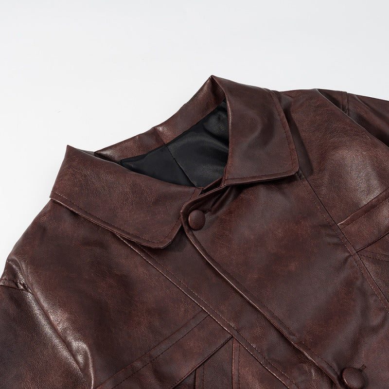 Women's short jacket made of faux leather in a boxy cut with snap button closure Fashion Glam