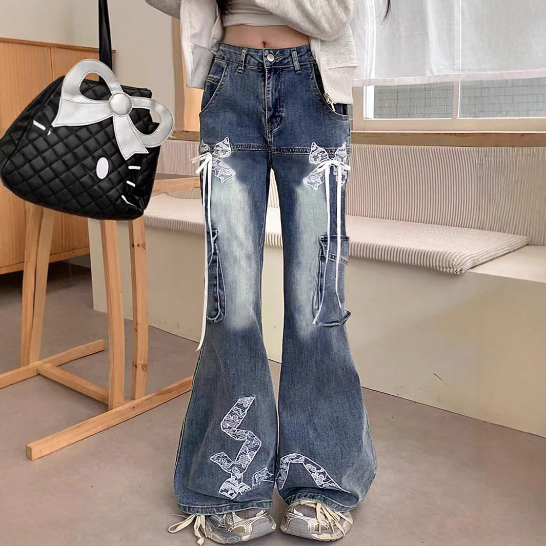 Women's wide flared cargo-style jeans with decorative ribbons, lace appliqués, and multiple pockets Fashion Glam