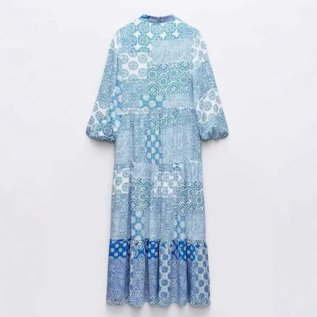 Women's maxi dress in patchwork print with V-neck, tiered skirt, and 3/4 sleeves Fashion Glam