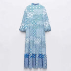 Women's maxi dress in patchwork print with V-neck, tiered skirt, and 3/4 sleeves Fashion Glam