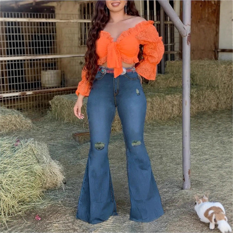 Women’s figure-hugging flared jeans with retro flair, featuring distressed knees and a waist-shaping comfort waistband Fashion Glam